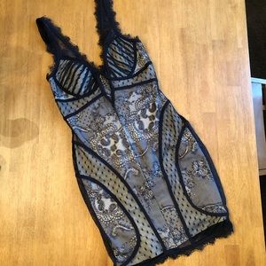 Bebe | Form-fitting, stretchy lace dress